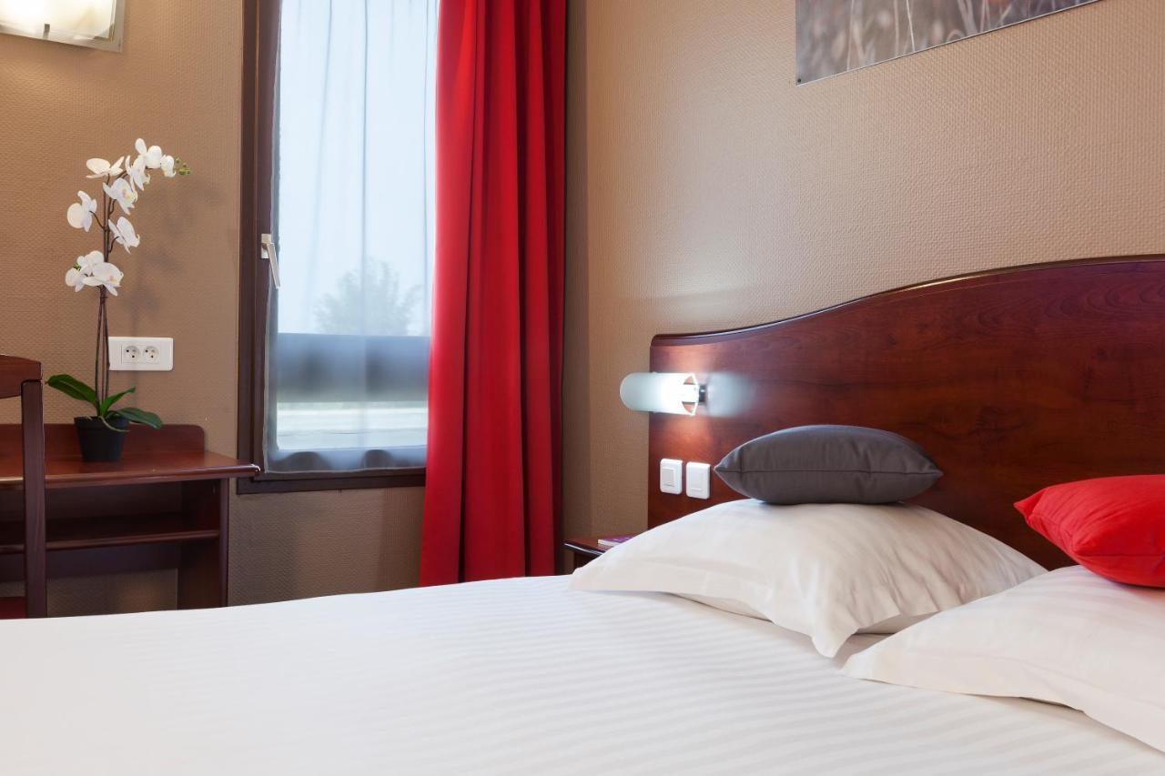 Brit Hotel Арас Екстериор снимка